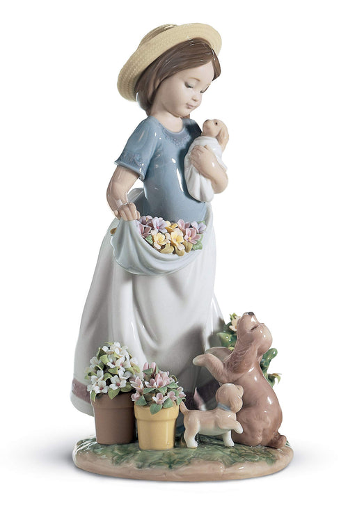 Porzellanfigur Mädchen mit Blumen handgefertigt coral-gold